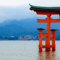 028 FacebookHeader Miyajima ItsukushimaShrine ToriiGate  The stark orange of the Itsukushima Shrine Torii Gate against the blues and greys of an overcast drizzly rainy day made for a great shot. — at Torii Gate, Itsukushima Shrine, Miyajima, Hiroshima, Japan