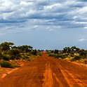 128 FacebookHeader AUS NT DevilsMarbles 2010OCT14 007  For some, this may seem a desolate and lonely road, but for most of us Territorian's it's the only way to travel most of the lower 2/3rds of the Northern Territory. — at The Devils Marbles, Northern Territory, Australia