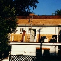 USA ID Boise 1112North7th 1996AUG ReRoofing 002  We had finished tearing off the old shingles from the back of the house. We removed 2 layers of cedar and 1 layer of asphalt shingles.    If you look closely at the top of the roof, you can see a slight bow from all of the weight that had been there. : 1996, 7011 West Ashland, Americas, August, Boise, Exterior, Fitzy's Poverty Palaces, Idaho, North America, Repairs, Roof, Roofing, USA