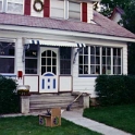 USA ID Boise 1112North7th 1996JUN05 002  Originally an open porch ran the width of the house. At some stage one of the owners had closed in the porch and then fitted a front door. The front door was cheap fly screen door that was 4 inches too short at the top. Every time the door closed. It felt as if the thing would fall out of the frame. : 1996, 7011 West Ashland, Americas, Boise, Exterior, Fitzy's Poverty Palaces, Idaho, June, North America, USA