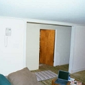 USA ID Boise 7011WAshland LL TVRoom 2002JUN08 001  The enlarged doorway has been trimmed out and a new operating phone replaces the pink wall mounted unit. : 2002, 7011 West Ashland, Americas, Boise, Idaho, June, North America, TV Room, USA