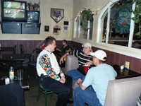 USA ID Boise 2002DEC14 Lions ChristmasParty 010  Yours truly, Sweetheart and Momo gas bagging. : 2002, 43rd State Crimson Lions, Americas, Boise, Christmas, December, Idaho, North America, Rugby Union, USA