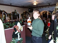 USA ID Boise 2002DEC14 Lions ChristmasParty 031  Nicky accepted the "Look At Me Get Hammered Now" door prize. : 2002, 43rd State Crimson Lions, Americas, Boise, Christmas, December, Idaho, North America, Rugby Union, USA