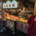 AS CHN NW SHA Xian 2017AUG12 007  While walking around Muslim Street, I came to learn that even though it is regarded as a tourist area, the locals actually consider it a " snack street " or an ideal shaded &amp; cool place for the locals to hang out during a hot summer. There is literally a plethora of restaurants and food stalls to choose from serving up a wide and varied range of edible offerings, with some of them specialising in selling cakes, dried fruits, breads as well as vast array of skewered barbecue meets cooked over charcoal barbecues. : 2017, 2017 - EurAisa, Asia, August, China, DAY, Eastern Asia, Muslim Quarter, Northwest, Saturday, Shaanxi, Xi'an