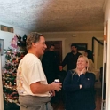 USA ID Boise 7011WestAshland 2003DEC13 ALCC 004  Jim's bride Jan having a chinwag with my neighbor Rick's mate Leroy. : 2003, 7011 West Ashland, Americas, Boise, Christmas, Christmas Cheer, Date, December, Events, Idaho, Month, North America, Places, USA, Year