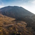 GTM ES Amatitlan 2019APR29 VolcanDePacaya 014  It’d be fair to say that it was a bit of hard yakka legging it the 2 hours to the base of Pacaya. Our first glimpse was a ribbon of red lava snaking its way down face of the ever changing volcanic mountain. It’s a barren, eerie and unique wasteland environment that the only sounds were the winds and molten car-size boulders coming done the various slopes. There were no real odours to that which I’d encountered at other natural geo-thermic sites, i.e. New Zealand and Hawaii. : - DATE, - PLACES, - TRIPS, 10's, 2019, 2019 - Taco's & Toucan's, Amatitlán, Americas, April, Central America, Day, Escuintla, Guatemala, Monday, Month, Region V - Central, Volcán de Pacaya, Year