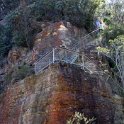 AUS NSW BlueMountains 2010SEPT30 ThreeSisters 011  The Giant Stairway provides a spectacular entry to the Jamison Valley, descending approximately 300 metres (1000 feet), via more than 800 steps and runways. : 2010, 2010 - No Doot Aboot It Eh! Tour, 2010 Sydney Golden Oldies, 3 Sisters, Alice Springs Dingoes Rugby Union Football Club, Australia, Blue Mountains, Date, Golden Oldies Rugby Union, Month, NSW, Places, Rugby Union, September, Sports, Teams, Three Sisters, Trips, Year